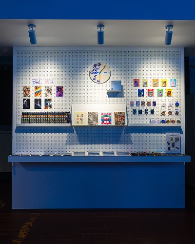 Confirmed Universe goods shop wall